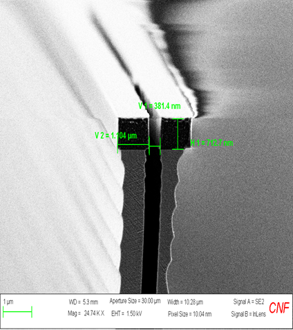 Deep silicon etch of DUV/e-beam lithography hybrid: 32:1 gap aspect ratio. 